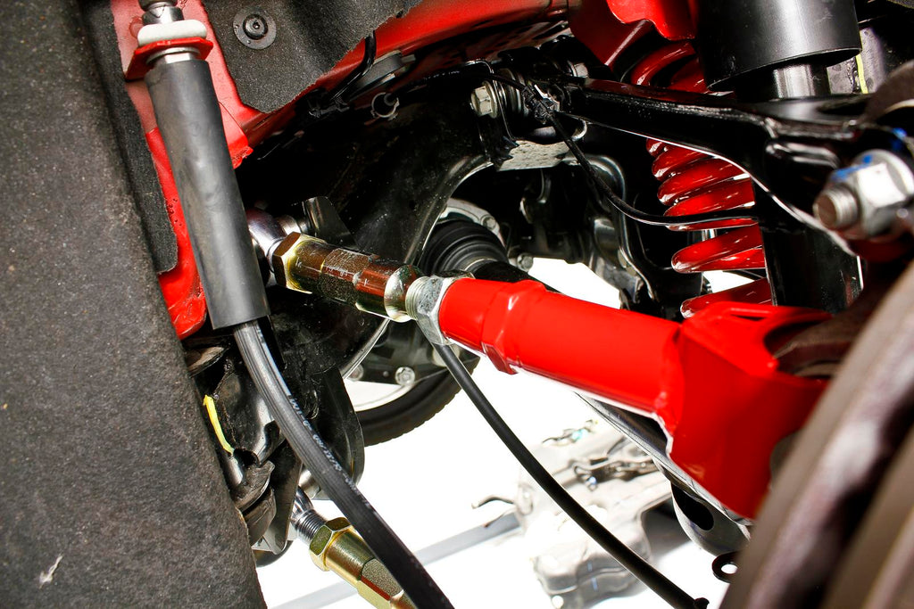 Upper trailing arm, on-car adjustable, rod ends