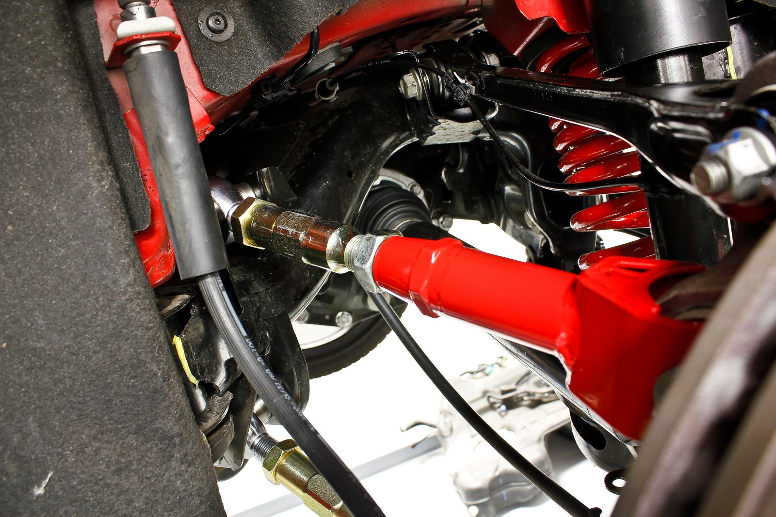 Upper trailing arm, on-car adjustable, rod ends